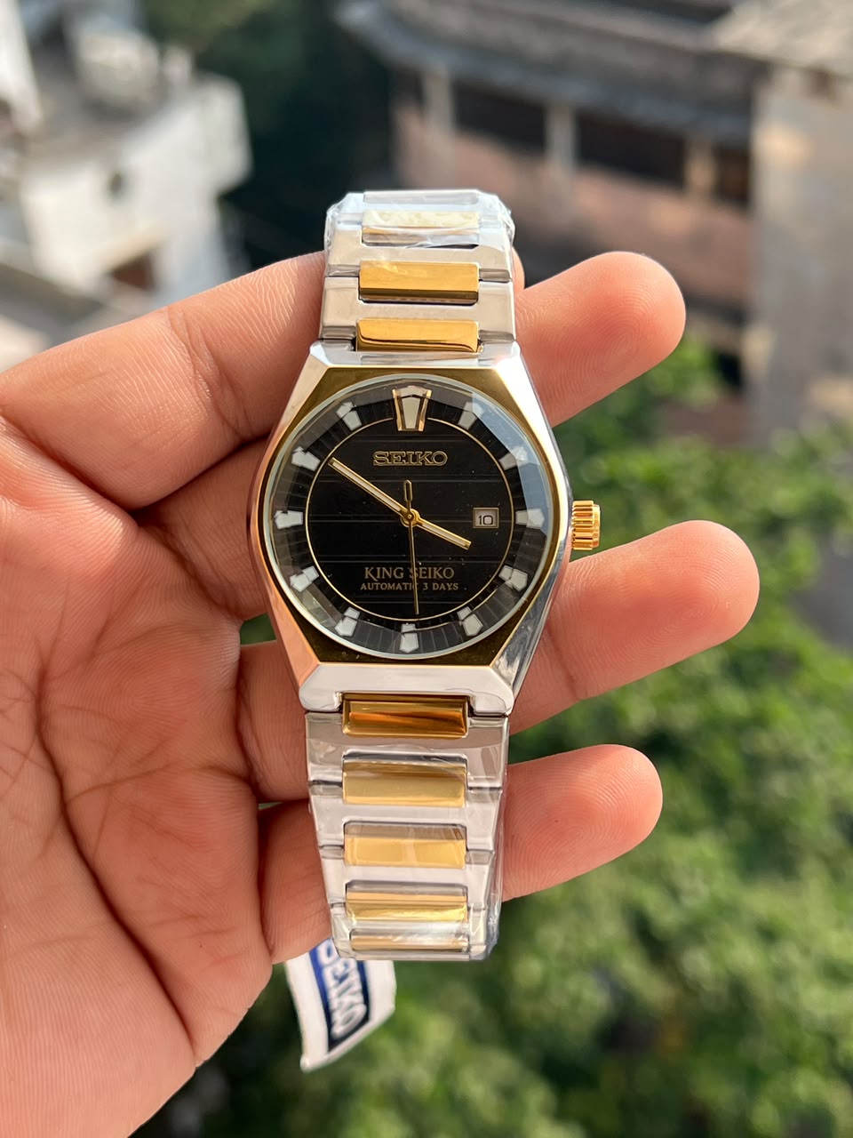 King Seiko style men's watch with date display and two tone bracelet