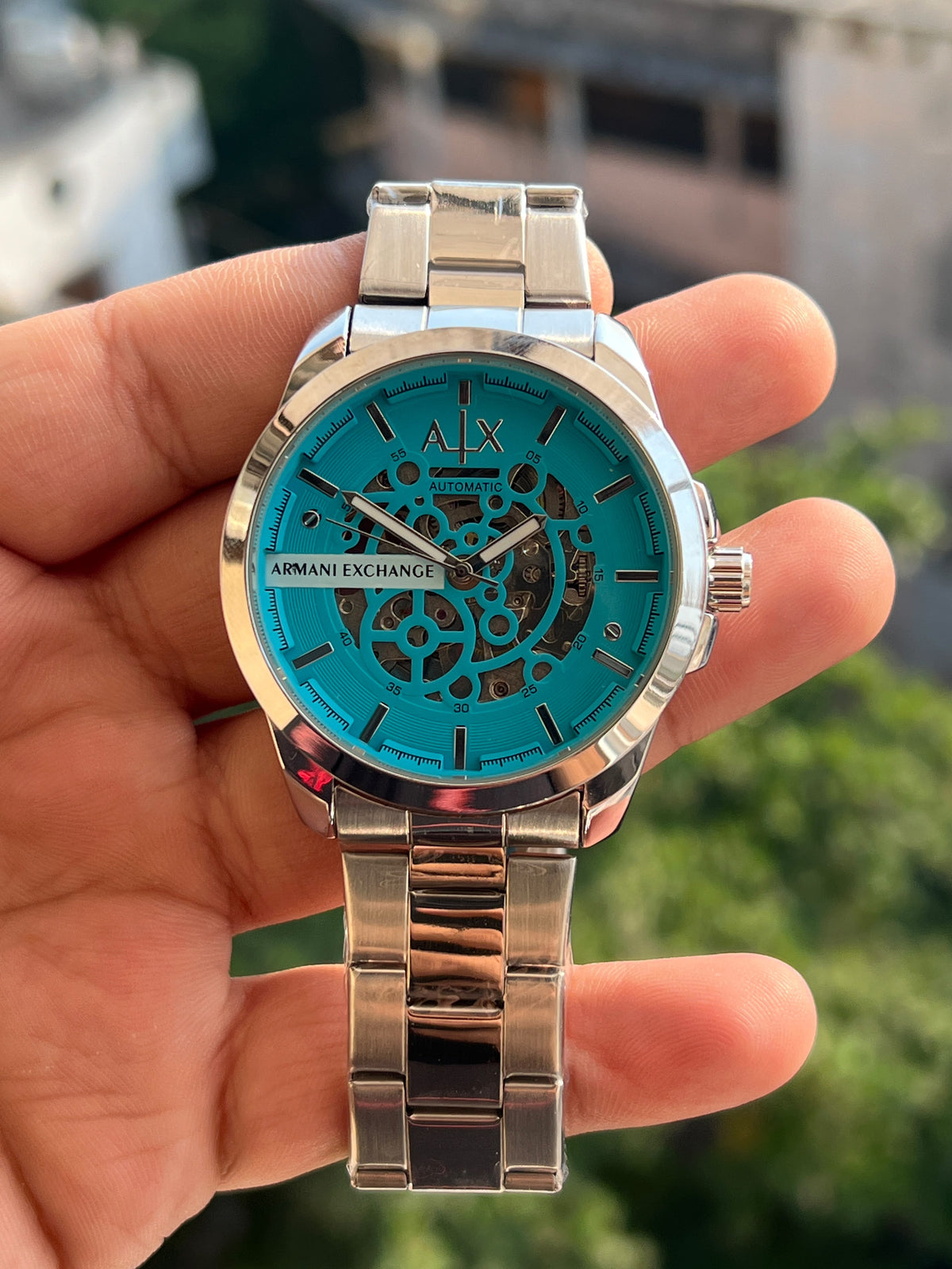 Armani-Exchange-AX-Turquoise-Blue-Skeleton-Dial-Dark-Markers-Automatic-First-Copy