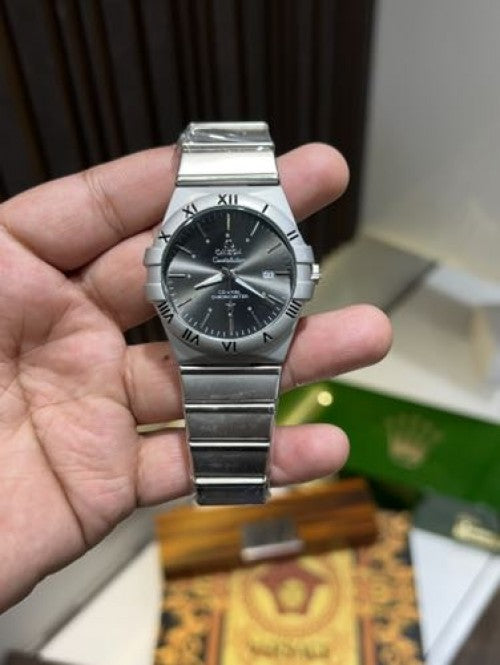 Omega Constellation Watch – First Copy | Master Copy Quality | Black Dial, Integrated Steel Bracelet