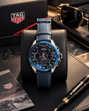 TAG Heuer inspired Carrera chronograph watch with blue bezel and black dial