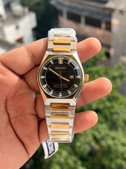King Seiko style men's watch with date display and two tone bracelet