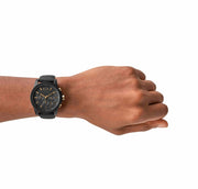 Black and gold chronograph men's watch with detailed sub-dials
