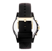 Black chronograph style watch with gold-tone hands markers and date display