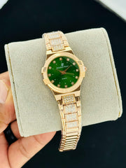 Royal Oak style green quartz watch with crystal style hour markers