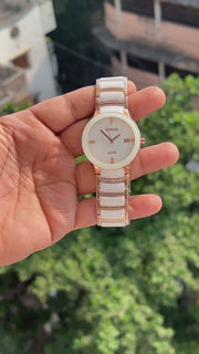 Rado Centrix style watch with diamond-style hour markers and date display