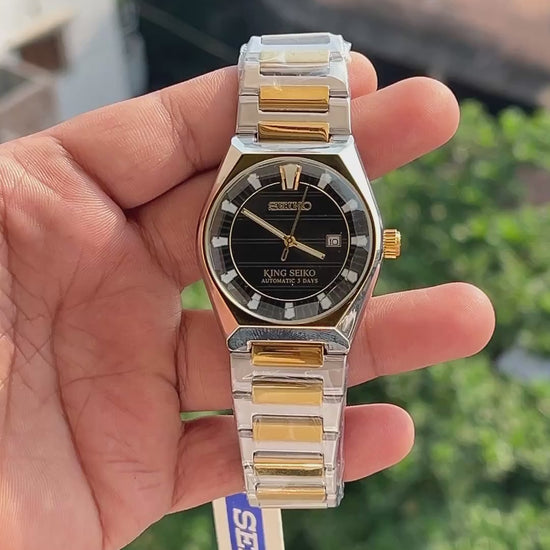 King Seiko inspired black dial watch with gold tone hands and markers
