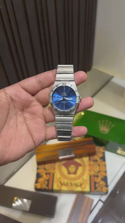 Omega Constellation Watch – First Copy | Master Copy Quality | Blue Dial with Gold Bezel