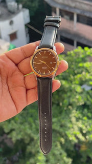 Premium-inspired quartz dress watch with date display by ANZORO